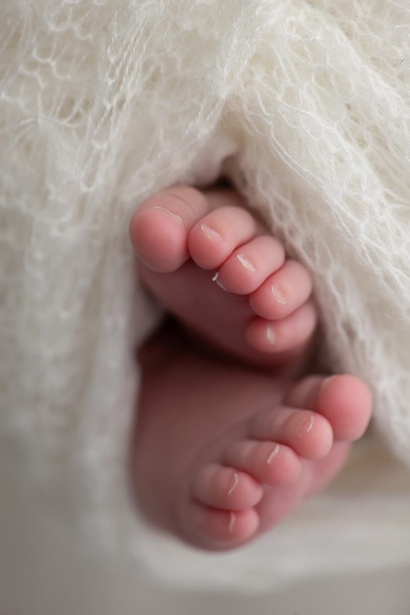 detalhe pé de bebê fotografia de recém-nascido